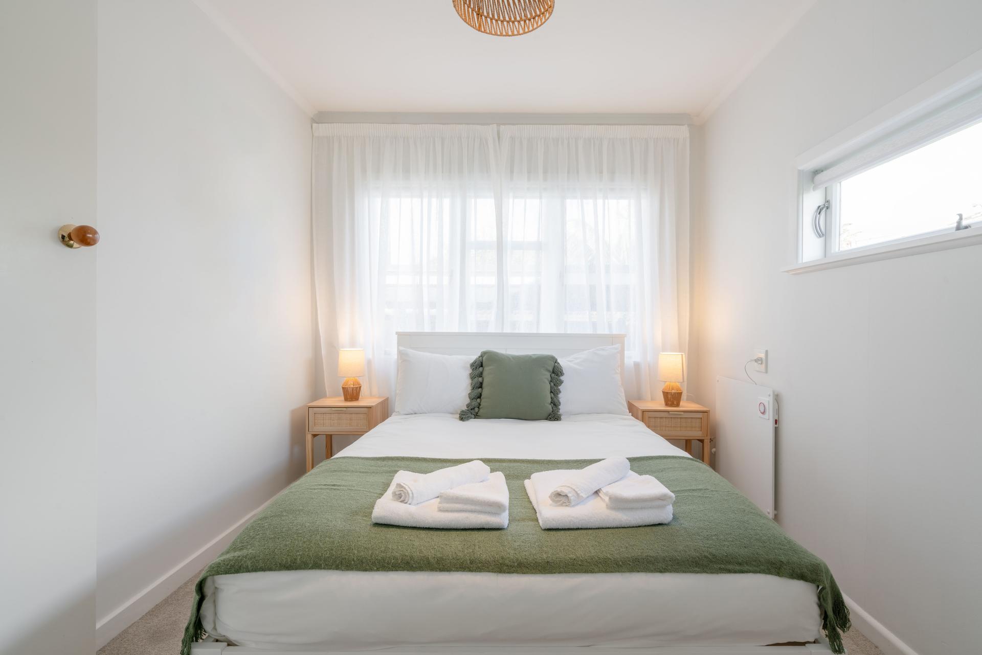 Modern white bedroom interior.